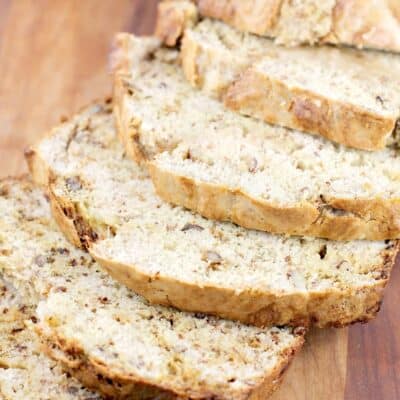 sliced banana bread on wood board