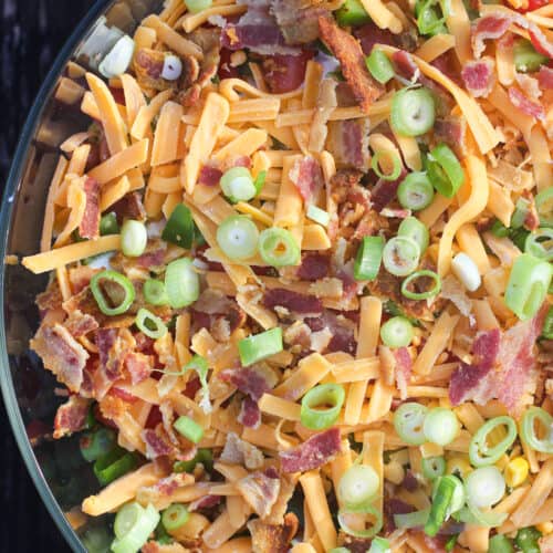 corn bread salad in glass bowl