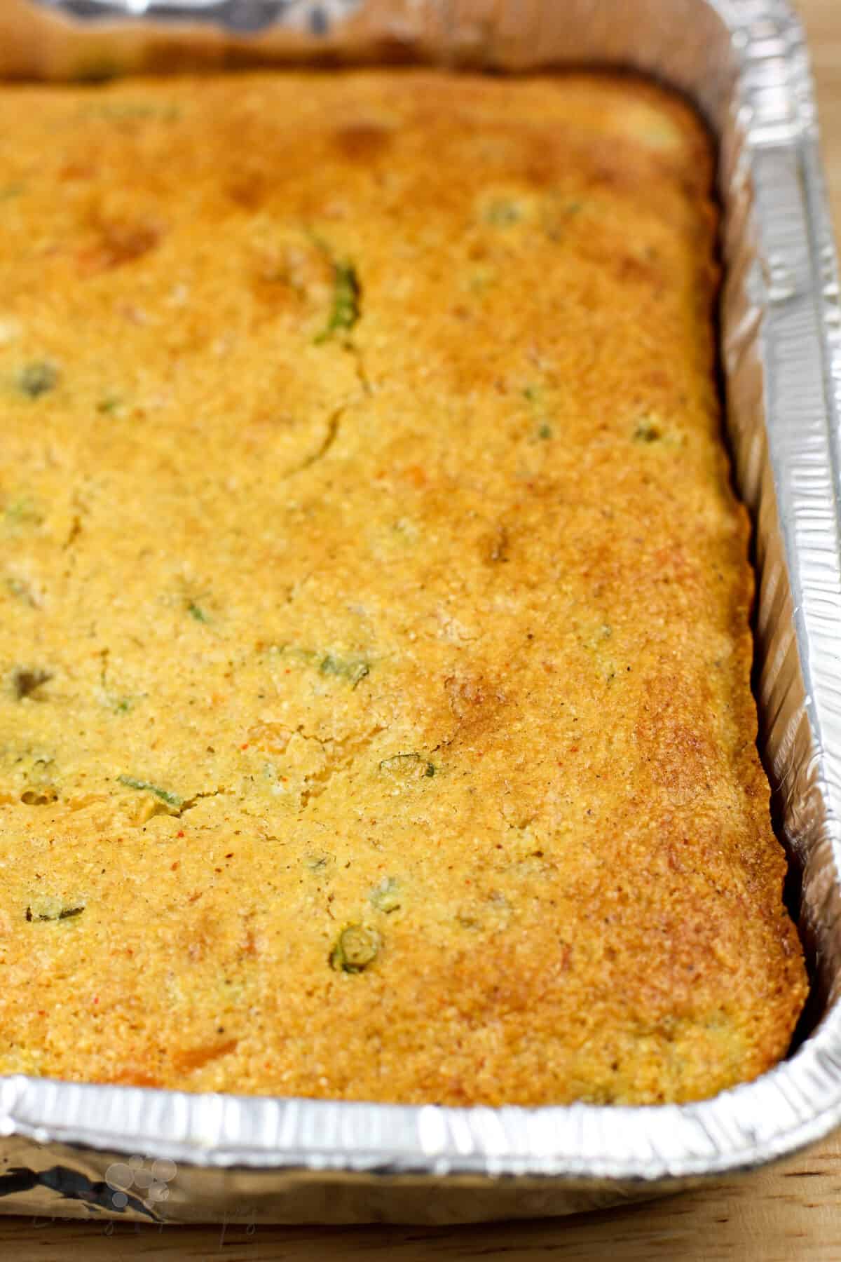 cooked cornbread in aluminum pan