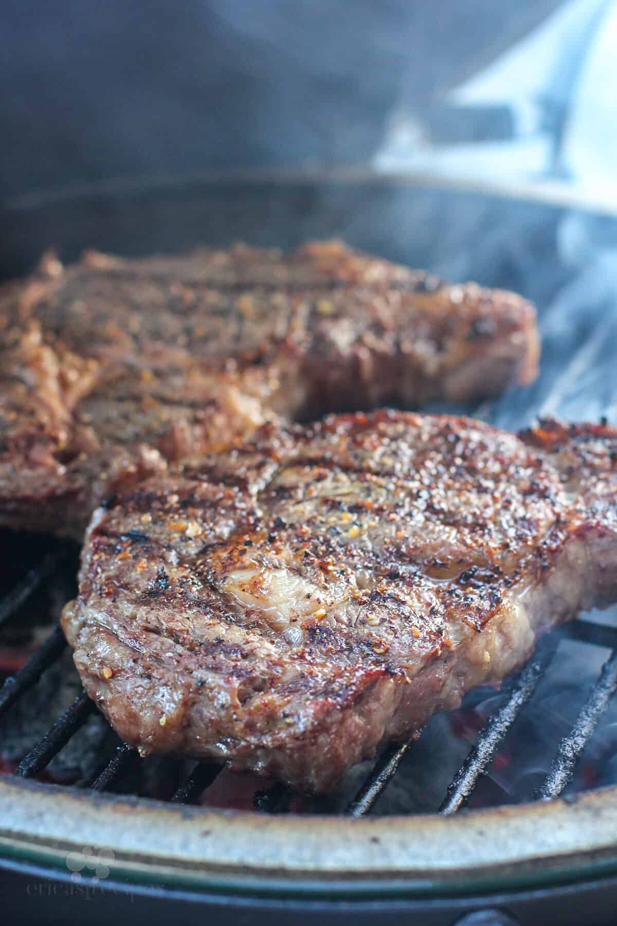 steak cooking on grill