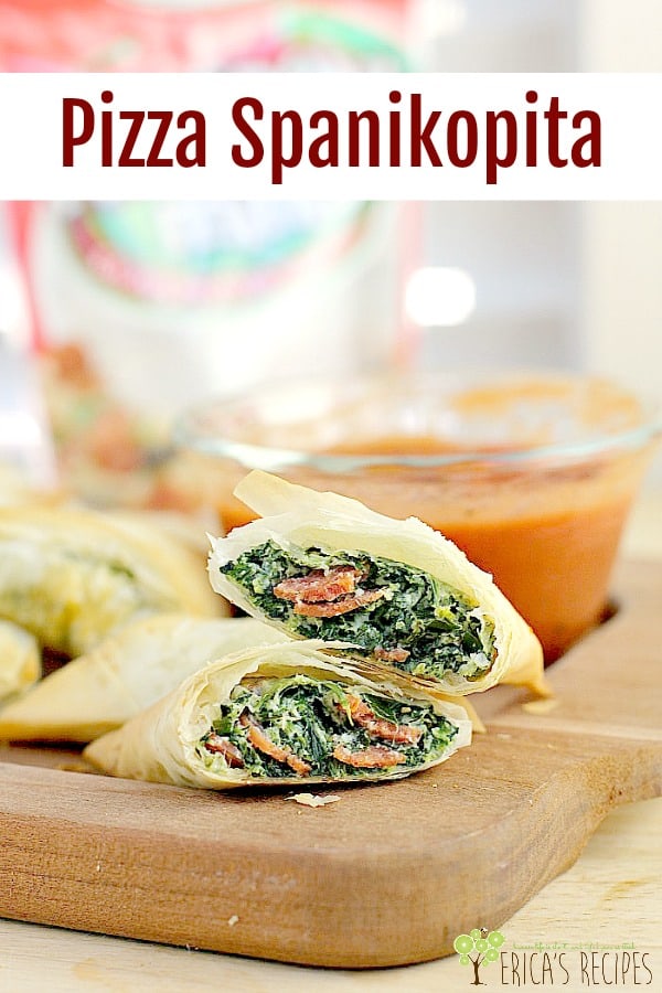 Bits of pepperoni in a creamy, garlicky spinach filling, wrapped a flaky fillo crust. With warm marinara for dunking, this Pizza Spanikopita appetizer twist on the classic spanakopita recipe will wow them all. #appetizer #partyfood #food #recipe #spanakopita #spanikopita #pizza #funfood #mediterraneanfood #greekfood