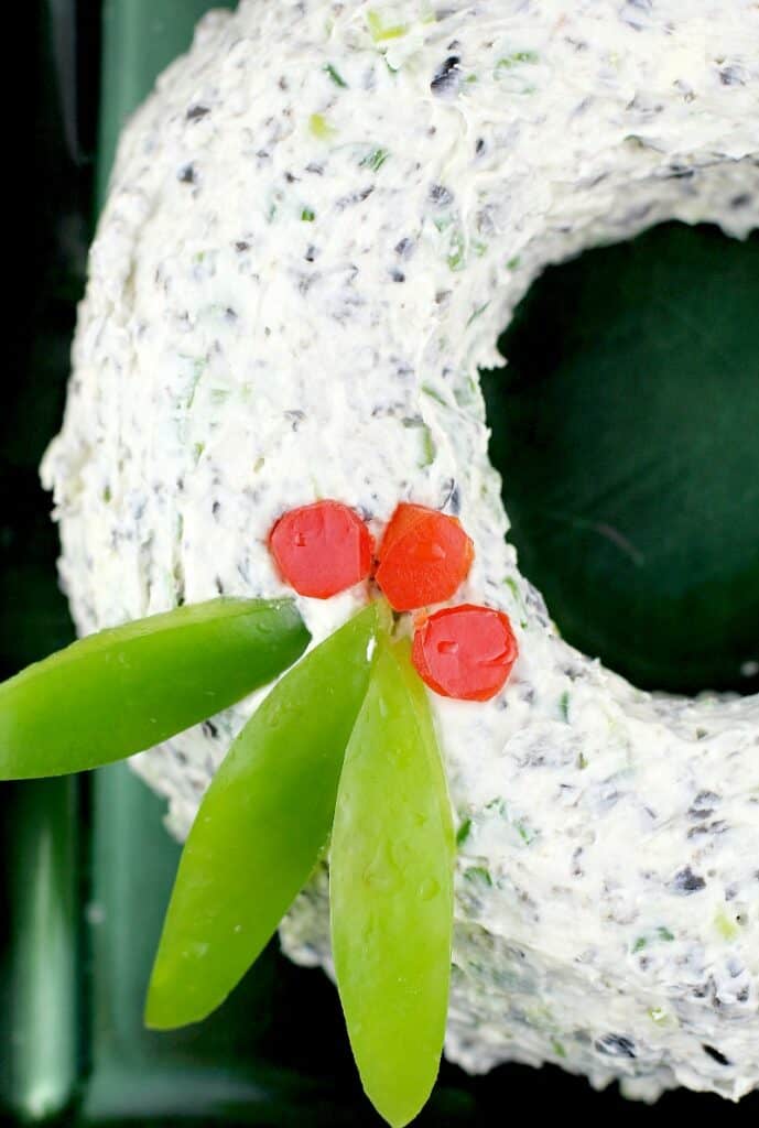 close in side view of the wreath to show the bell pepper garnish