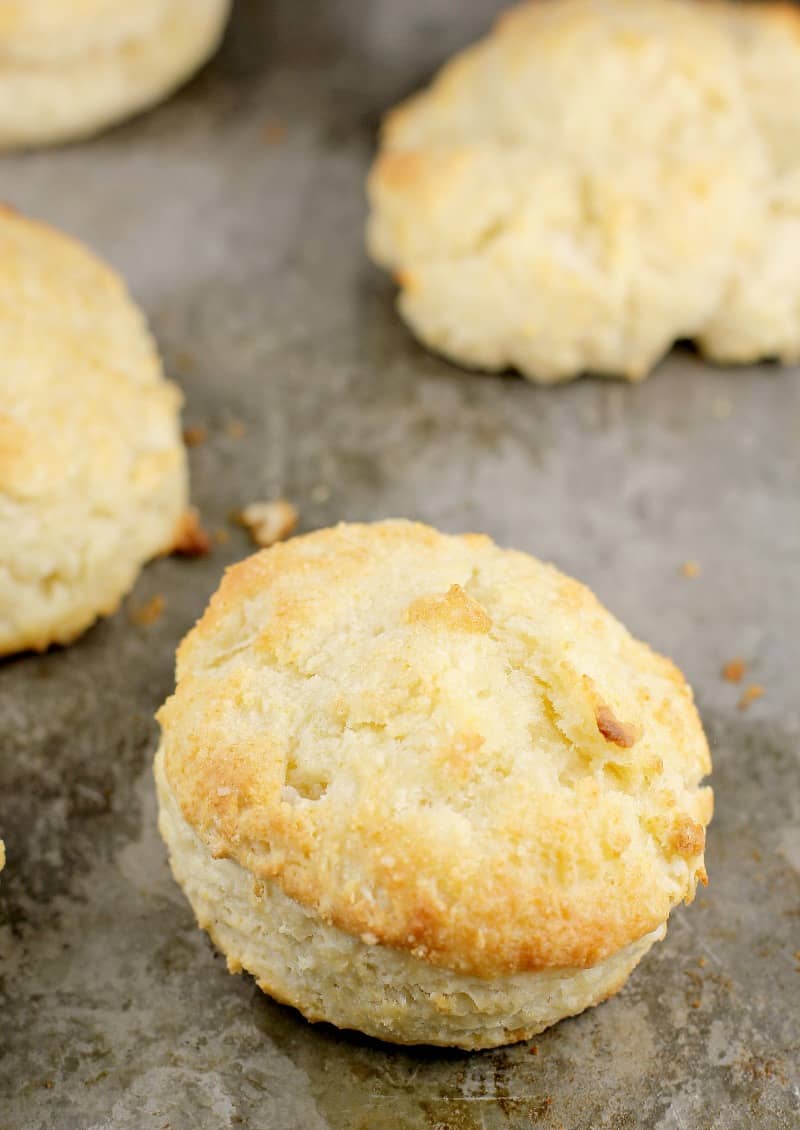 cooked biscuits on a cookie sheet