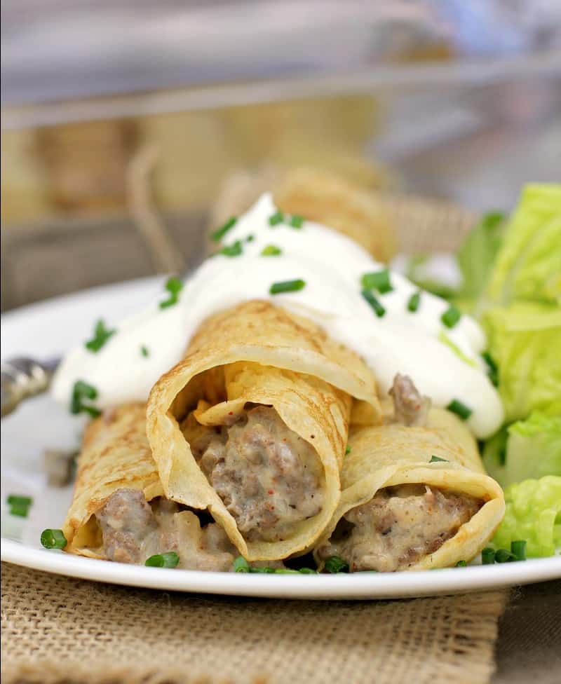 close view of 3 crepes to show ground beef filling