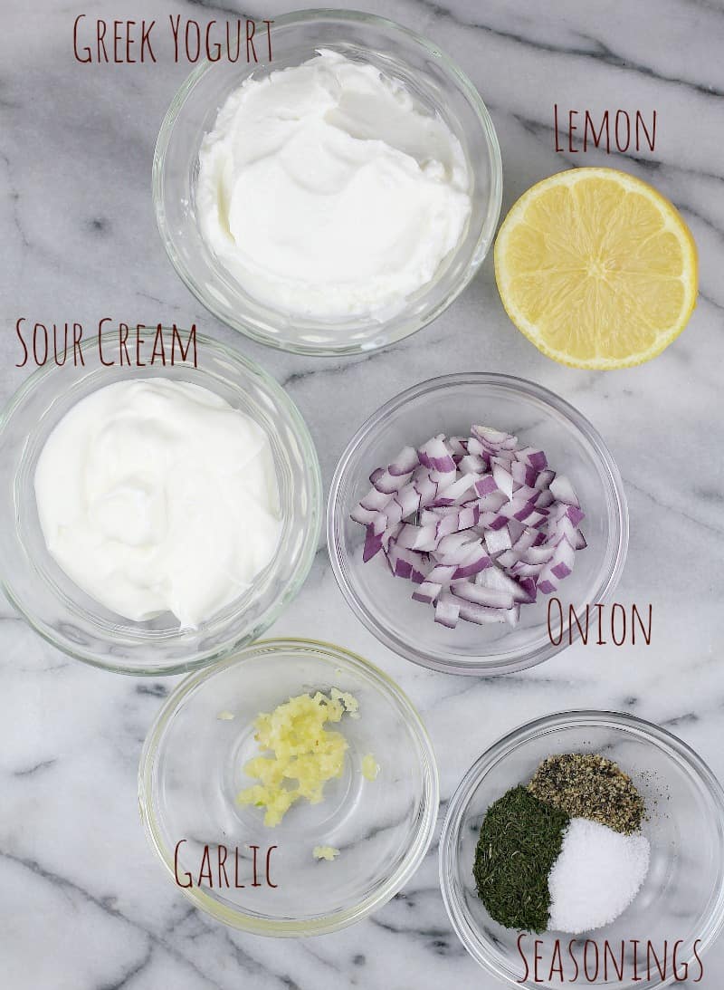 top down view of the Greek yogurt dip ingredients, each in a little clear glass bowl