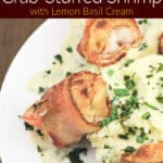 image for pinterest with text overlay of recipe title bacon-wrapped crab-stuffed shrimp with lemon basil cream