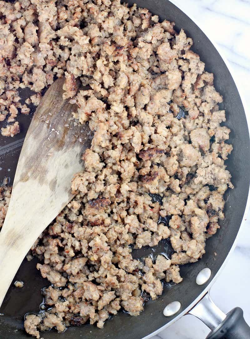 cooked sausage in a skillet.