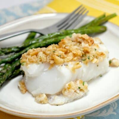 plated cod dinner with asparagus