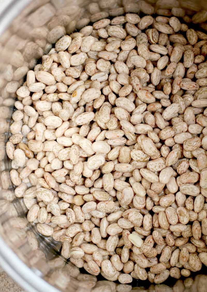 pot full of cleaned pinto beans after soaking overnight in water