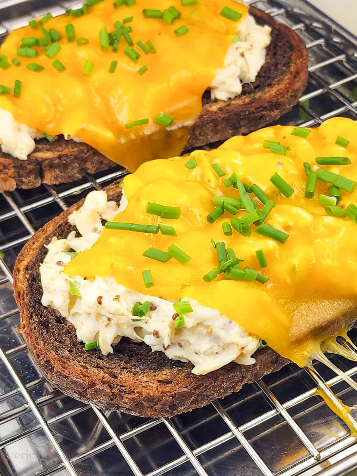 crab melt sandwiches on bake rack