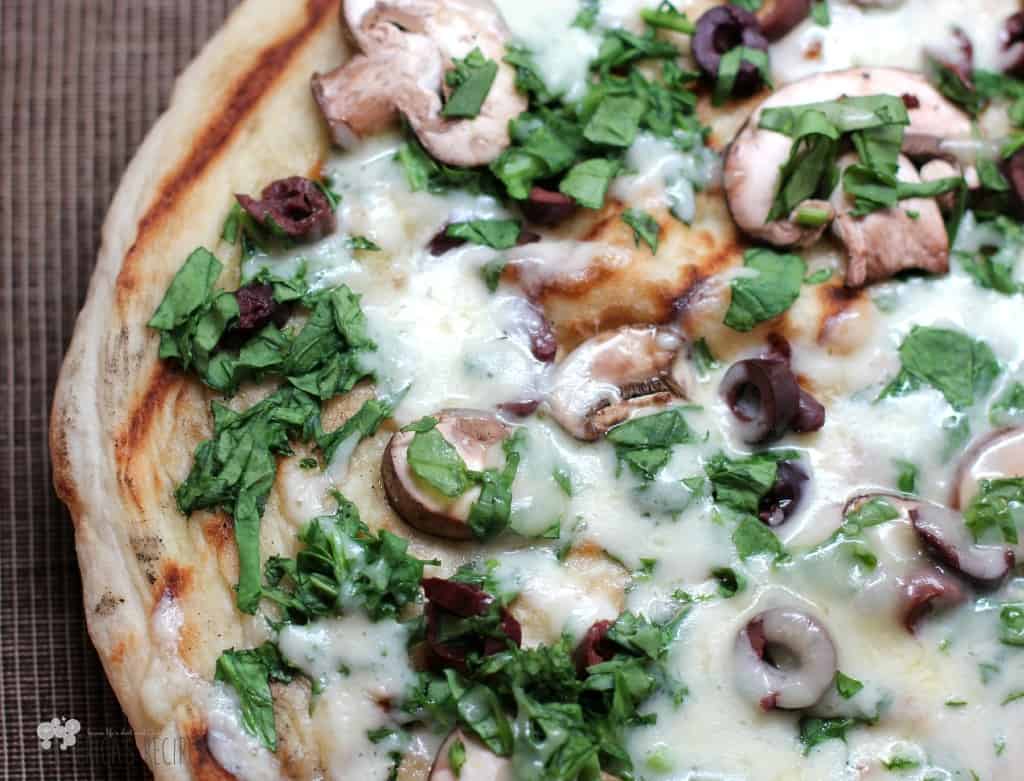 Grilled Bistro Pizza with Mushrooms, Kalamata Olives, and Fontina | EricasRecipes.com