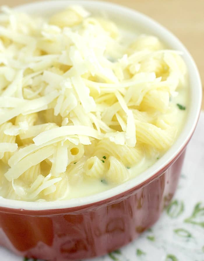 shredded cheese on top of uncooked casserole