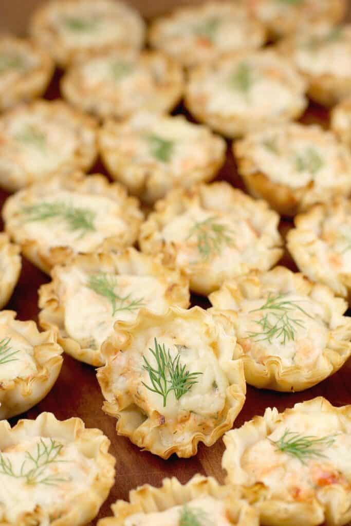 wood tray with the finished mini tarts