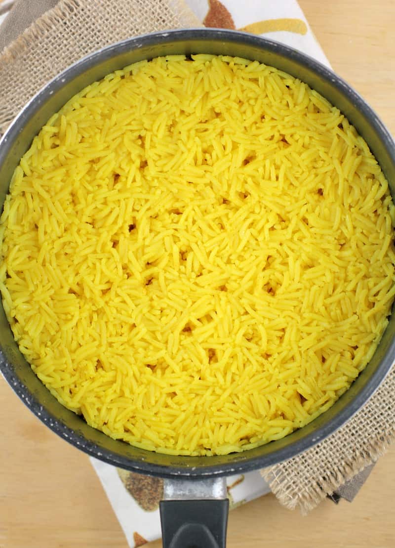 cooked termieric rice in a pot