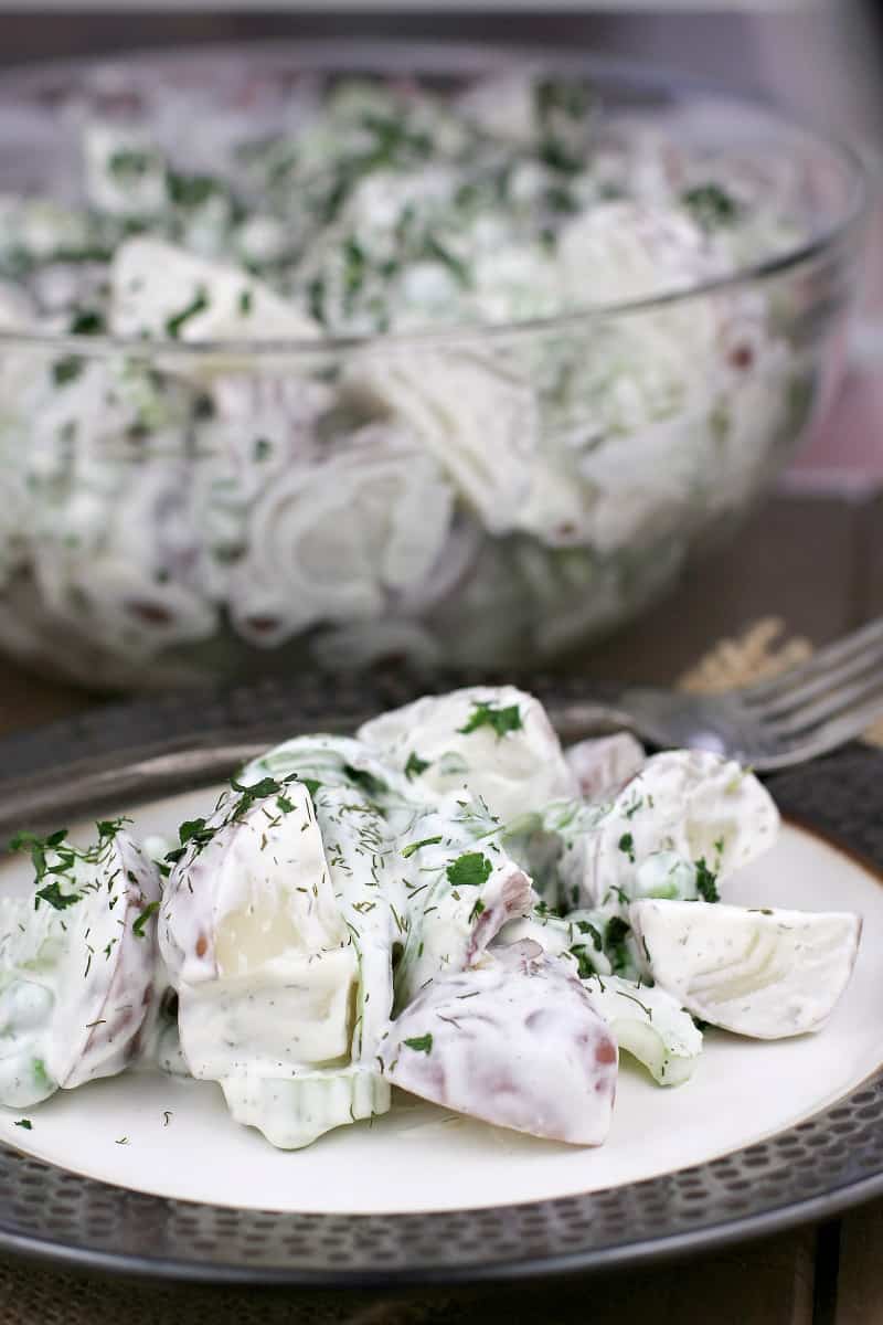 image for sharing on Pinterest with text overlay of recipe title Spring Potato Salad