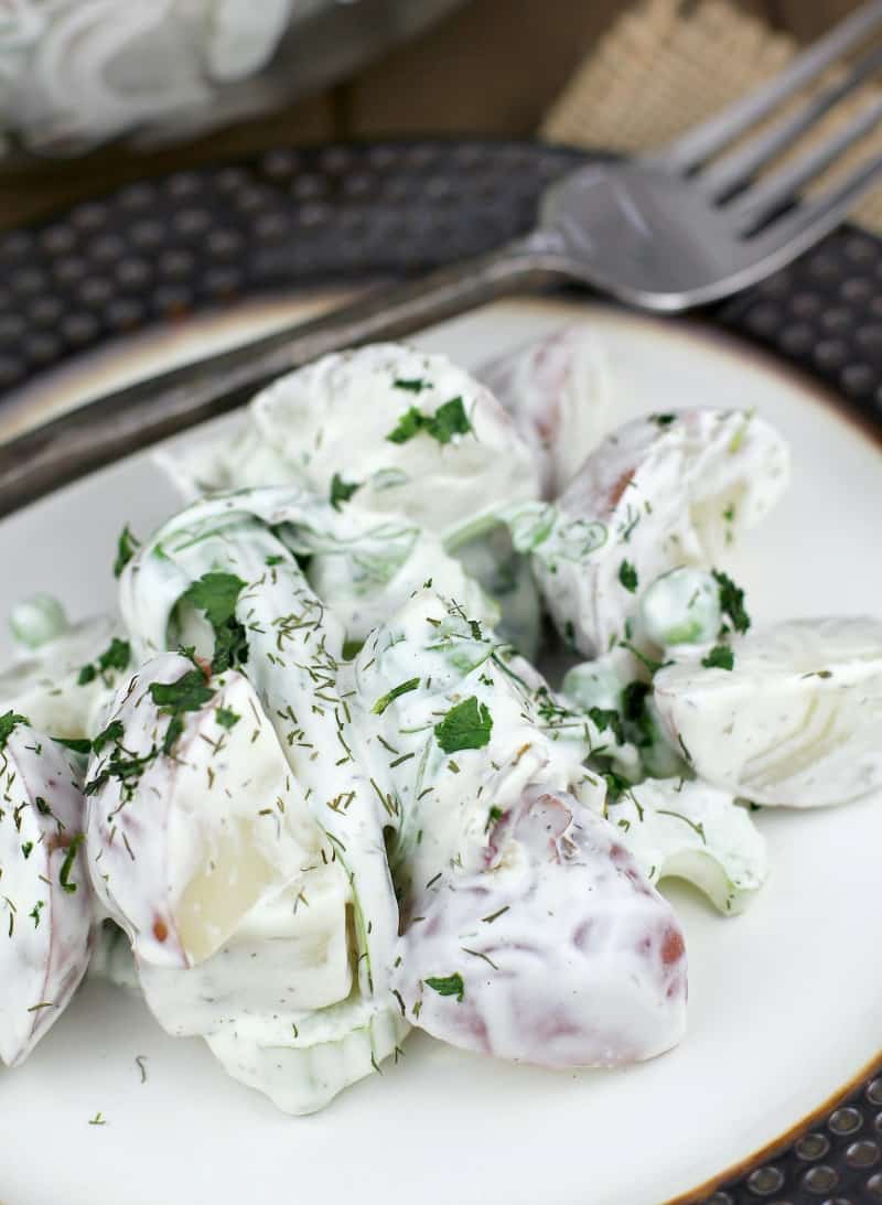 salad plated with a rustic fork