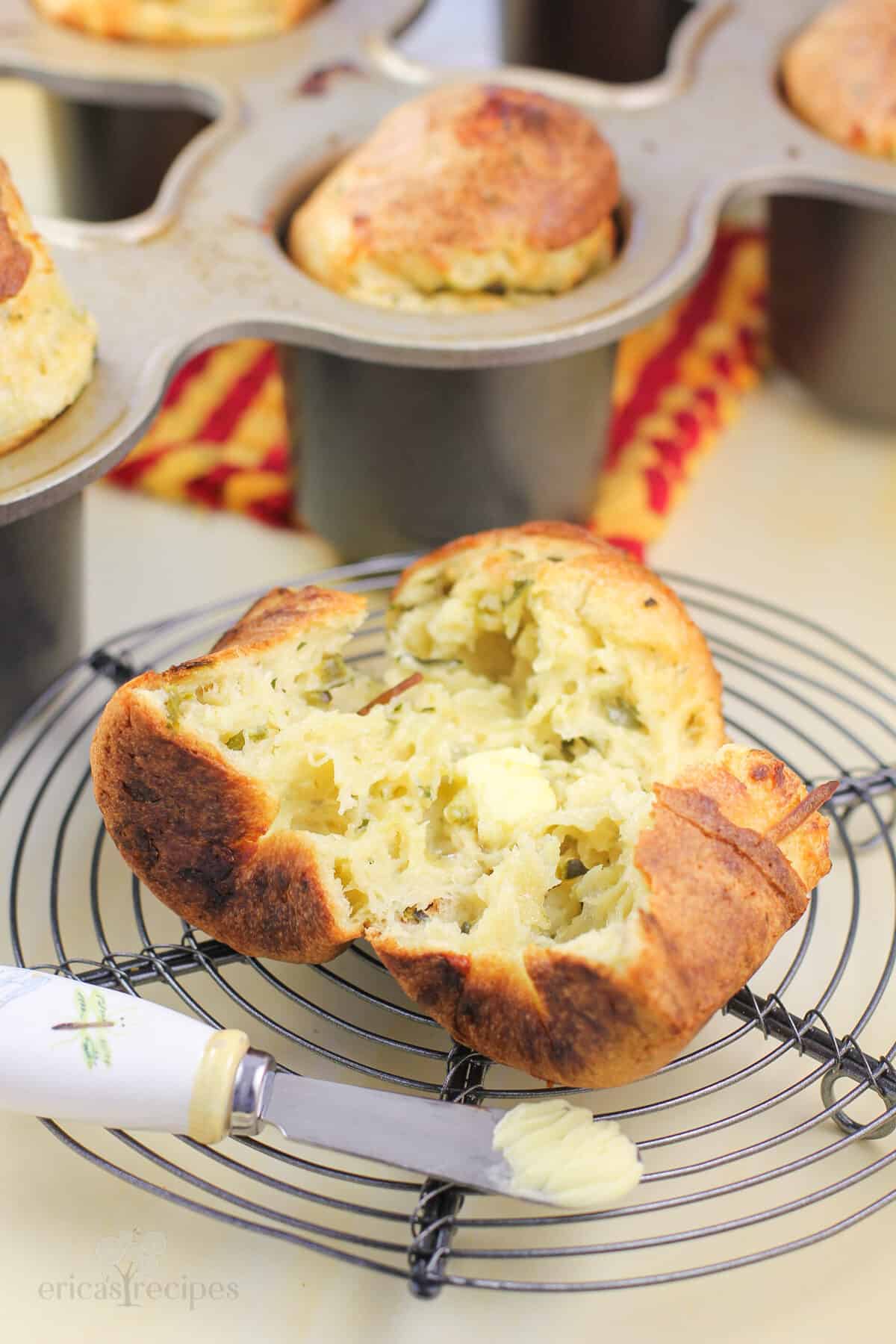 split popover on wire rack with small butter knife