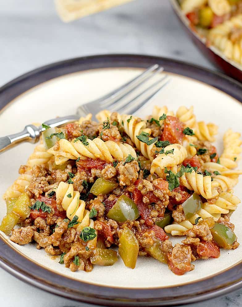 zoomed view of the sloppy joes on a plate with a fork