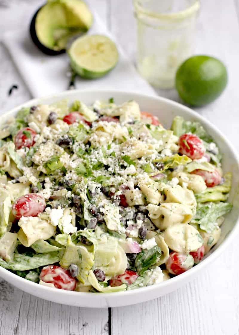 complete salad in a large white bowl