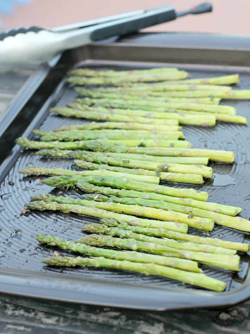 roast asparagus in dark rimmed bake sheet