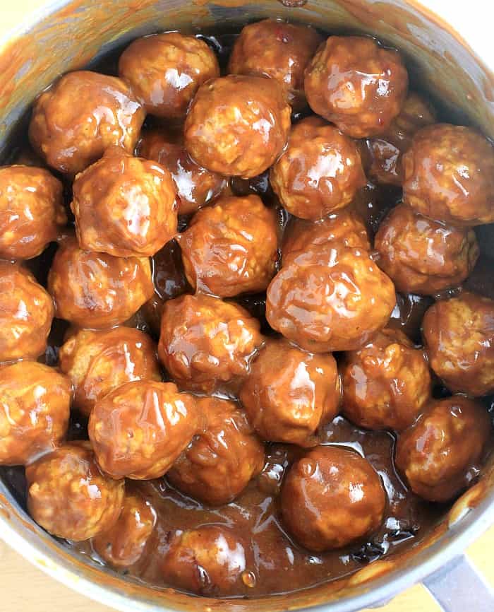 saucy meatballs in a saucepan