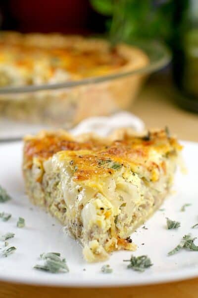 serving of quiche on white plate