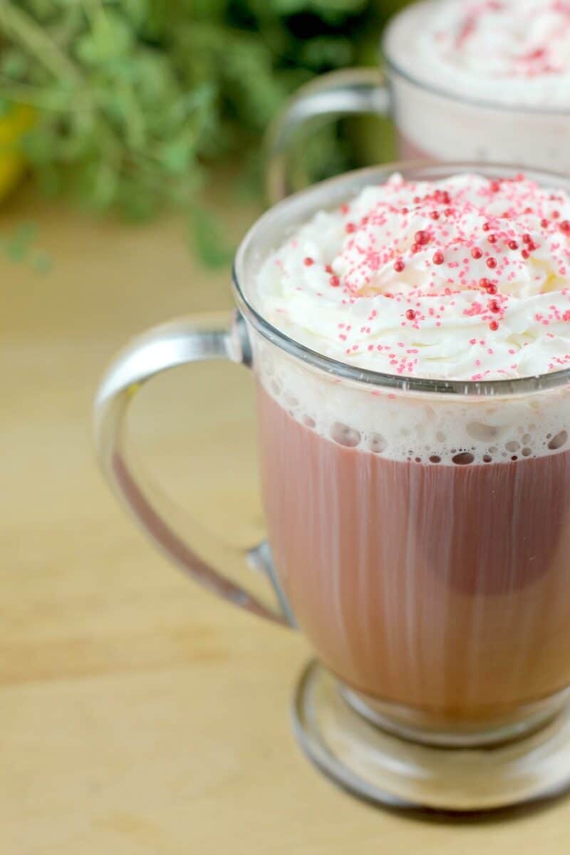 side view of glass mug with red velvet latte