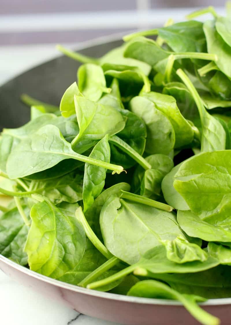 spinach leaves in a skillet