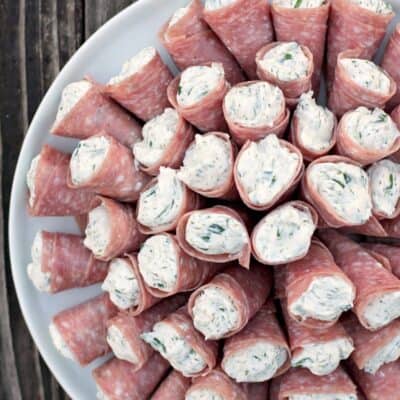 salami cornucopia on a plate on wood