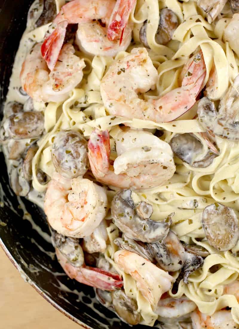 this shrimp linguine recipe, in the pan. shrimp and mushrooms in a cream sauce with pasta