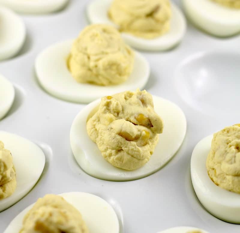 view of the egg yolk mixture in an egg white before garnish