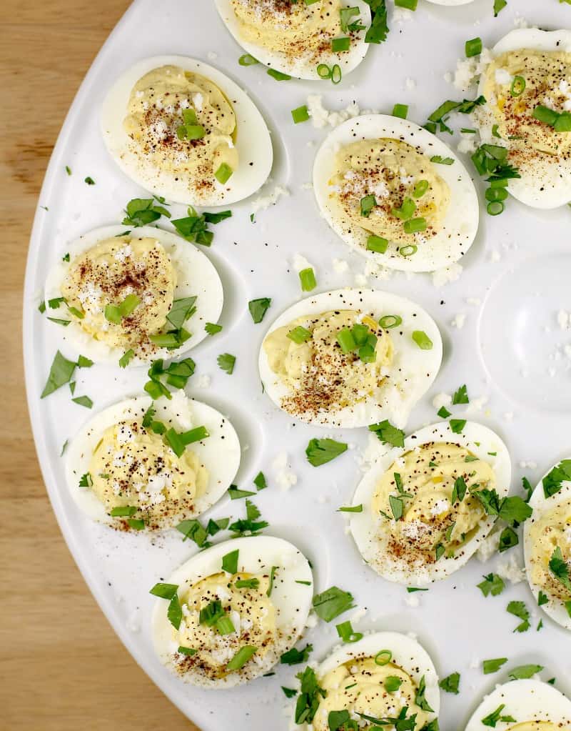 top down view of lots of Mexican style deviled eggs