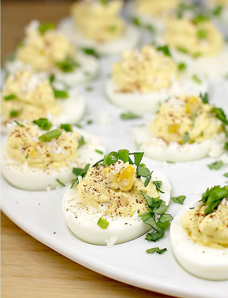 the finished corn and egg recipe, on a white plate