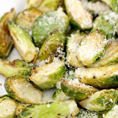 close in view of the finished sprouts dusted with parmesan