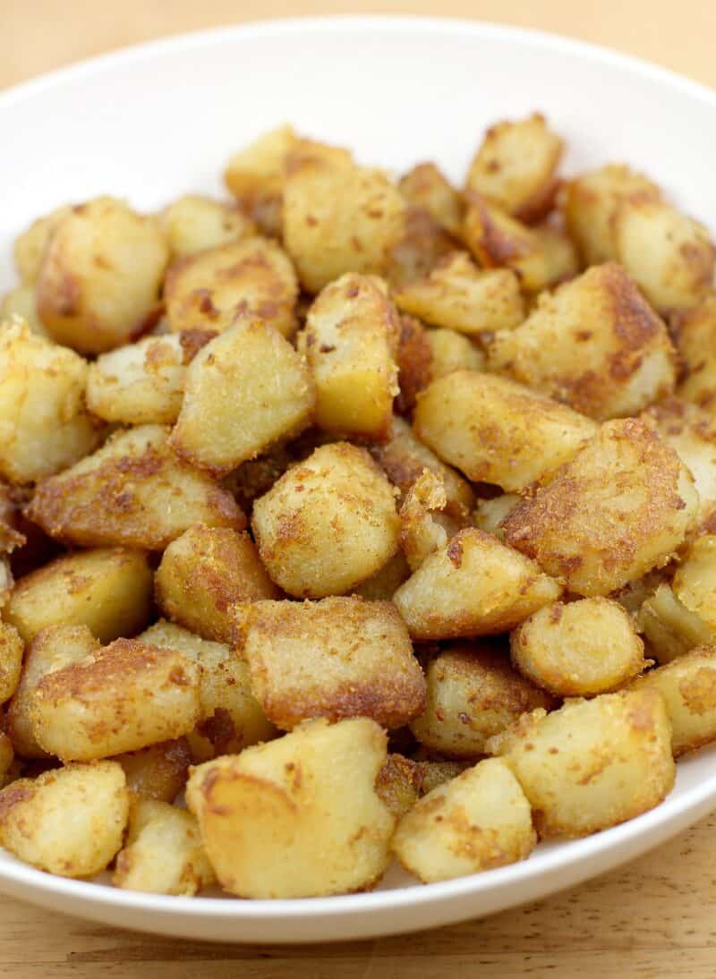 cooked potatoes in white bowl