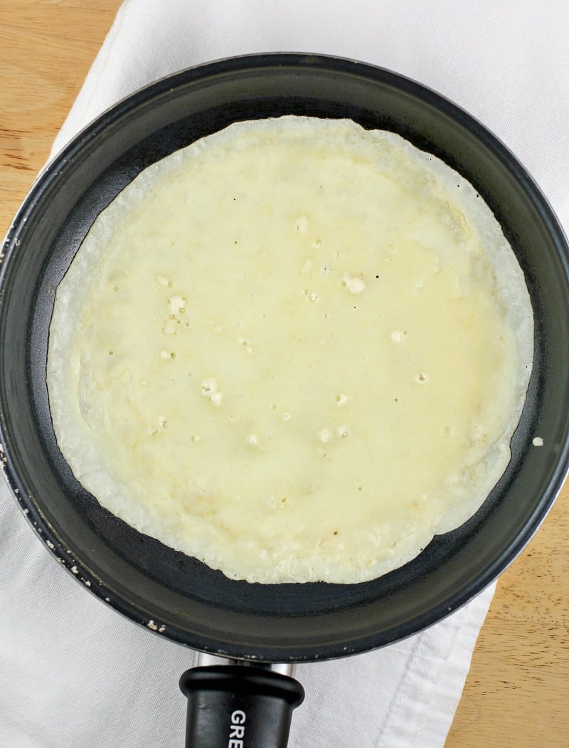 crepe batter in a pan