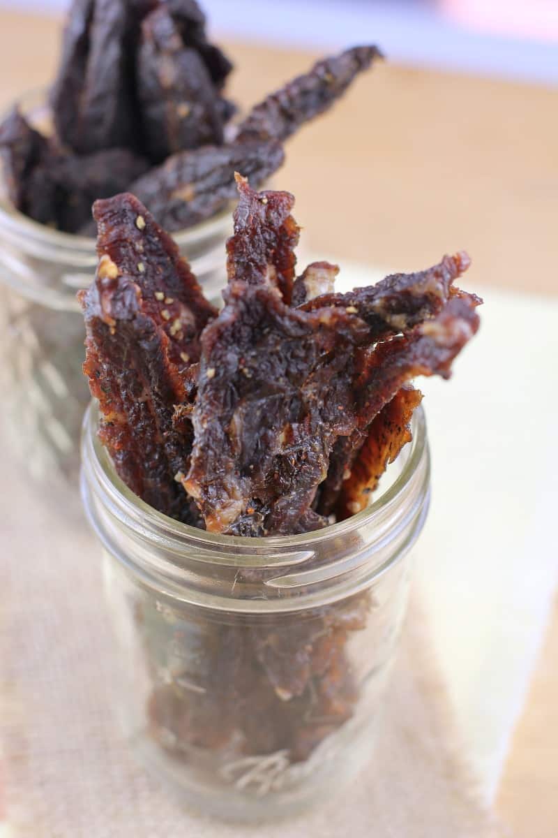 glass mason jars filled with jerky