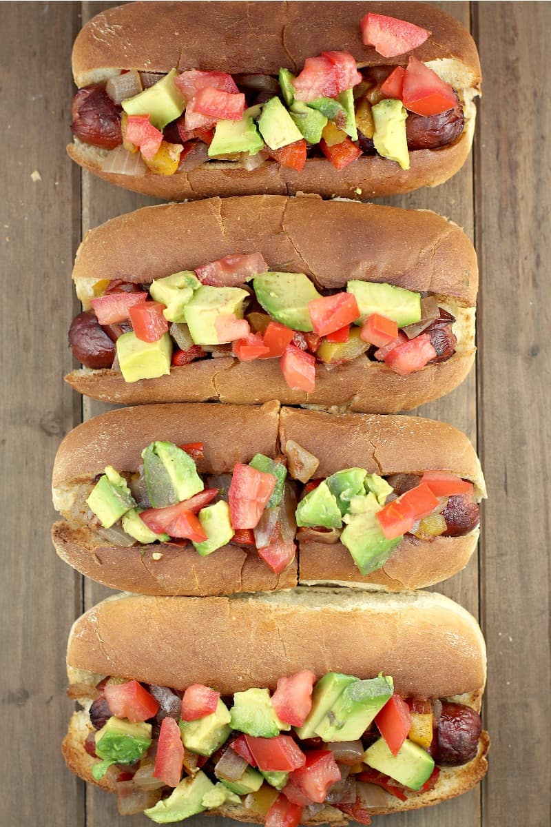 top down view of 4 hot dogs in buns