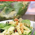 image for pinterest with text overlay recipe title Rotini Pasta Salad with Spinach