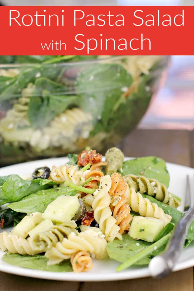 image for pinterest and social sharing with text overlay of recipe title Rotini Pasta Salad with Spinach