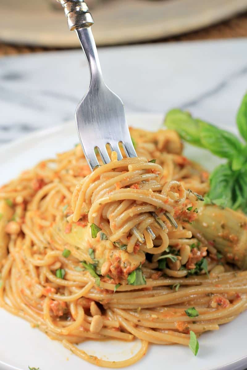 fork twirling up a bite of spaghetti with sauce