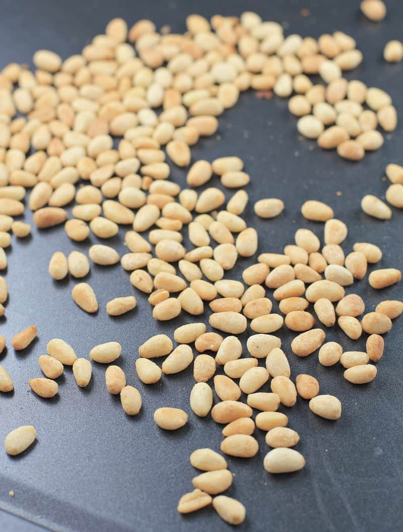 toasted pine nuts on bake sheet