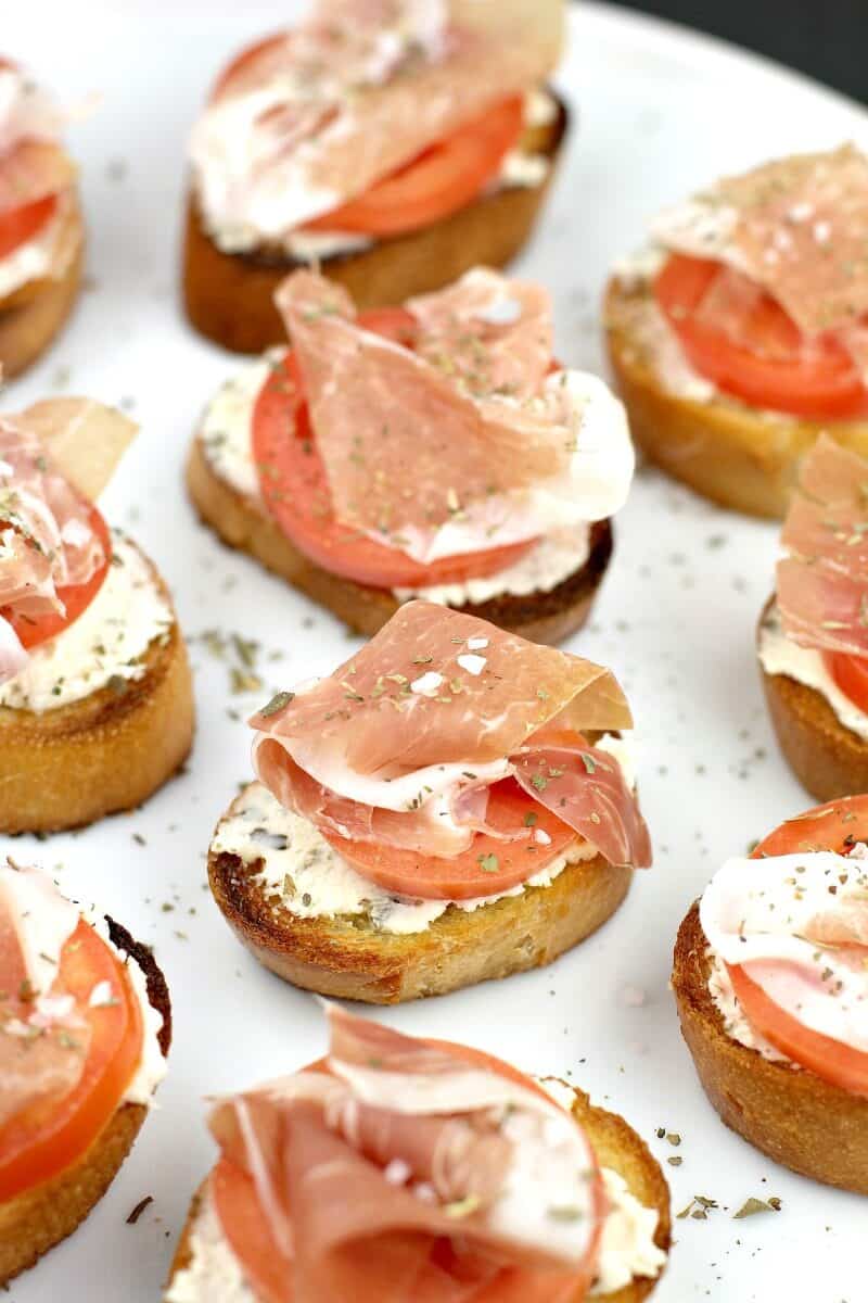 crostini appetizers presented on a white dish