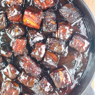 pork belly burnt ends in cast iron pan