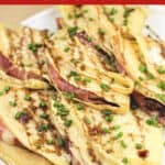 image for pinterest of prepared recipe with text overlay Crepes with Prosciutto and Cheese