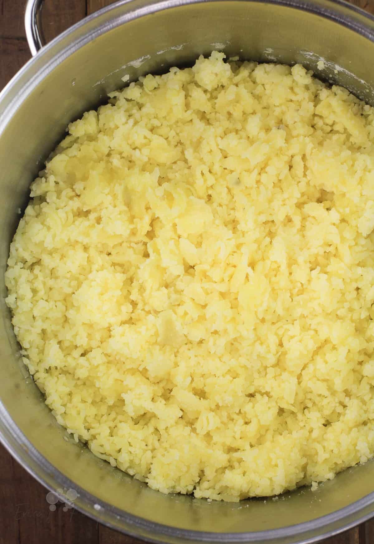 https://ericasrecipes.com/wp-content/uploads/2021/05/Boursin-Mashed-Potatoes-4-2-1200x1746.jpg