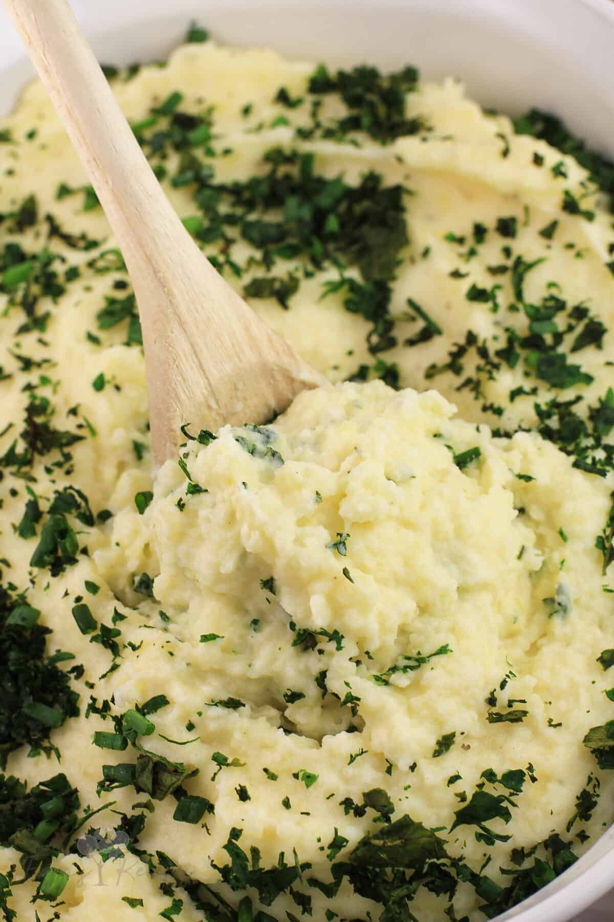 wood spoon with boursin cheese potatoes