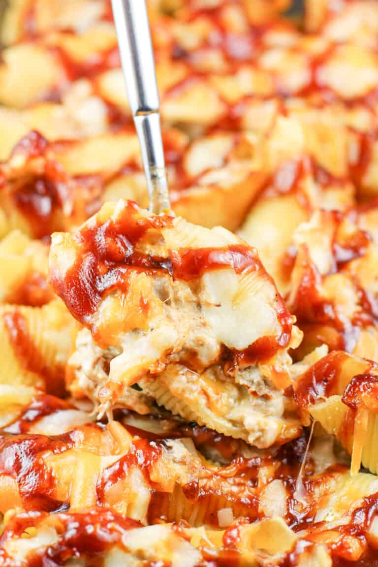spoon holding stuffed pasta shell