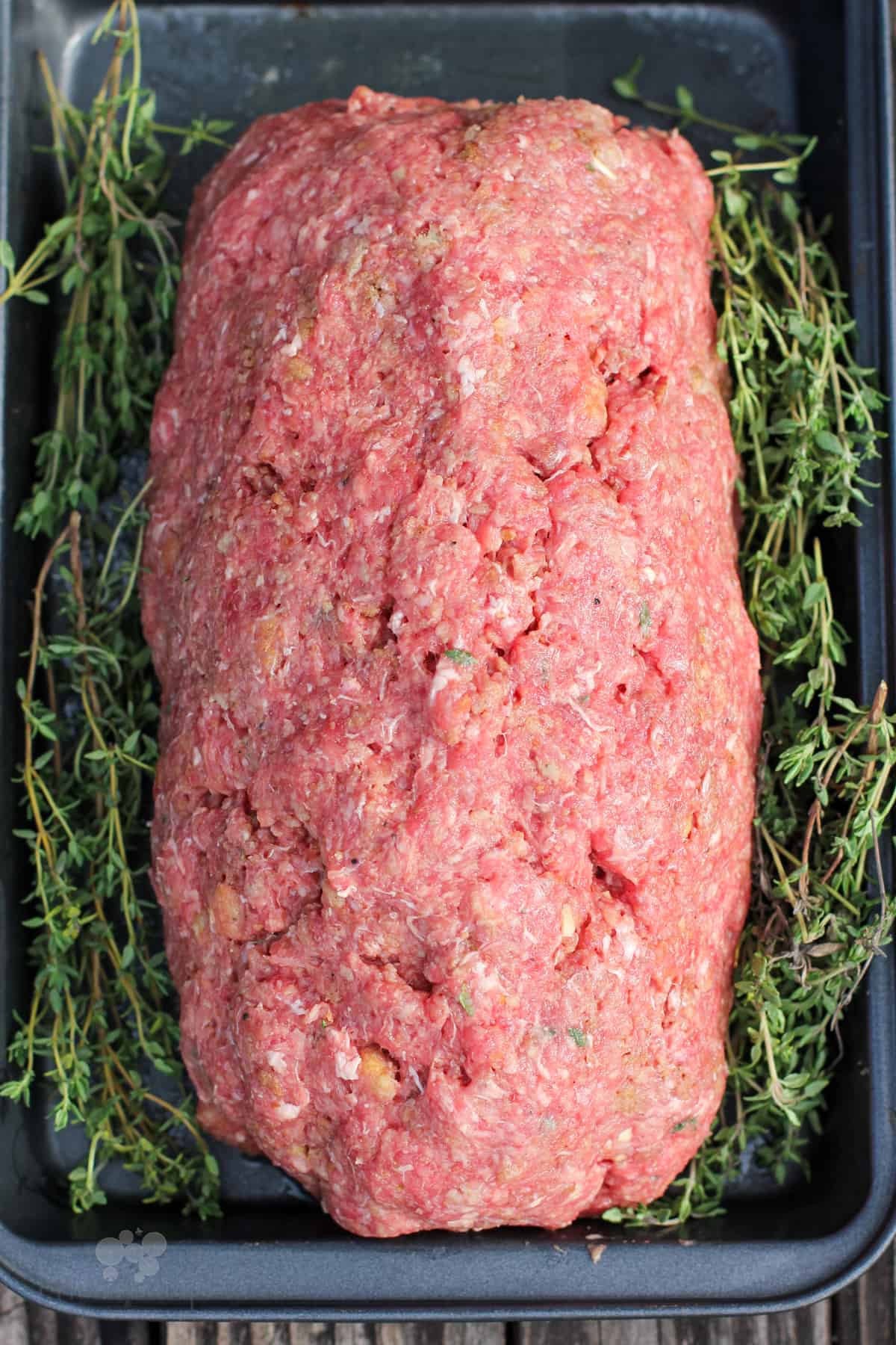 formed meatloaf in pan prior to cooking