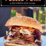 image for pinterest with text overlay juicy smoked pulled pork (a big green egg recipe)